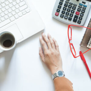 businesswoman holding cup of coffee on modern white office table flat lay t20 ro901l
